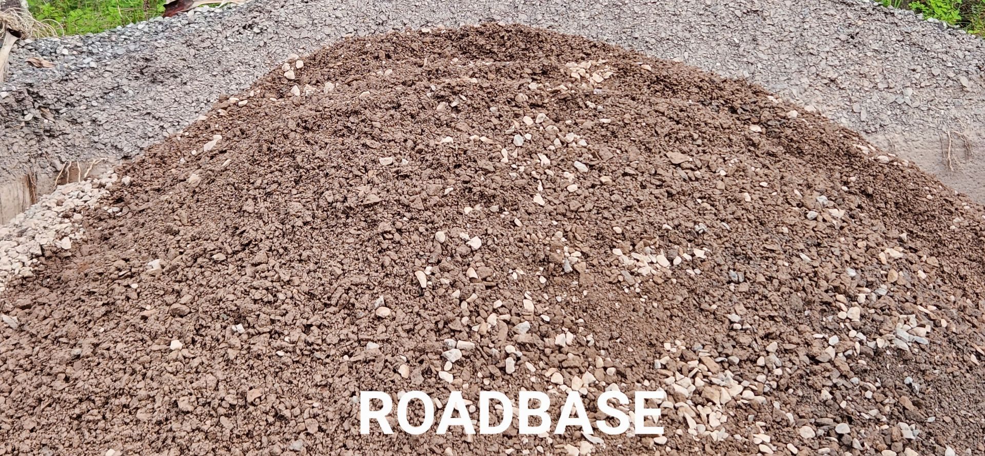A Pile of Gravel is Sitting on Top of a Pile of Dirt — T&G Sand and Gravel In Sippy Downs, QLD