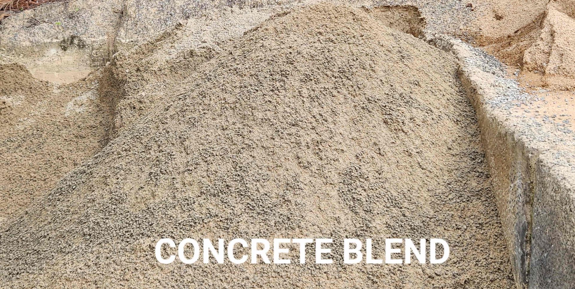 A Pile of Concrete Blend is Sitting on Top of a Pile of Sand — T&G Sand and Gravel In Sippy Downs, QLD
