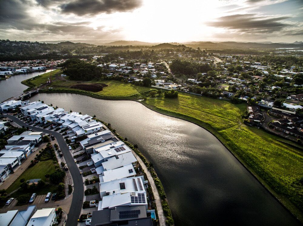 An Aerial View Of A City With A River Running Through It — T&G Sand and Gravel In Buderim, QLD