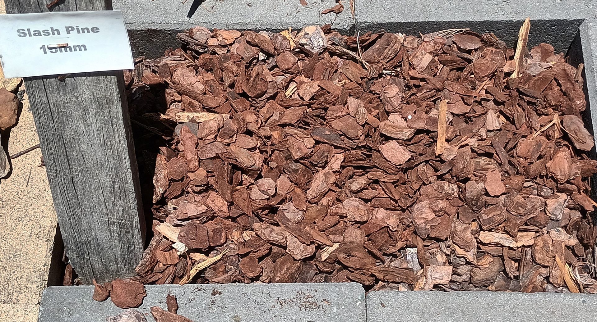 A Pile Of Slash 15mm Mulch— T&G Sand and Gravel In Sippy Downs, QLD