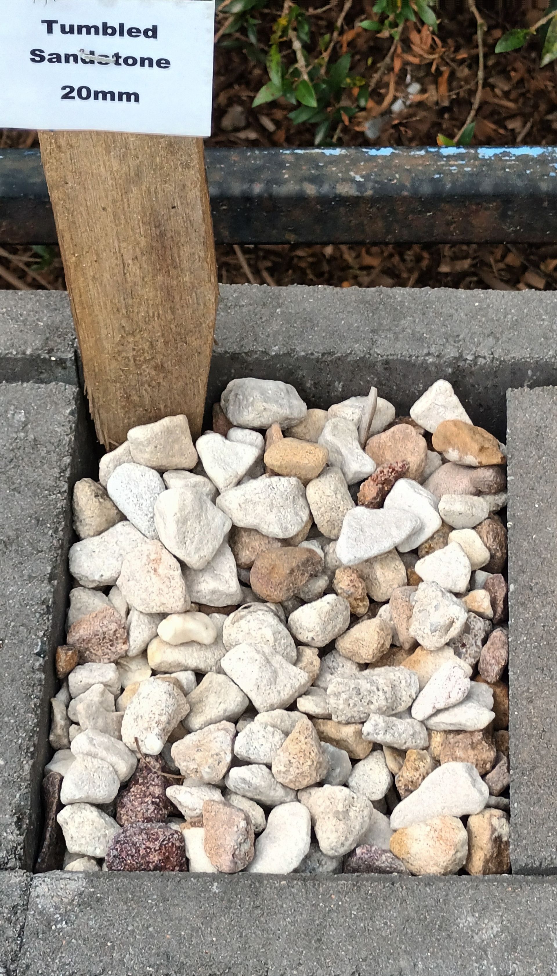A Pile of Tumbled Sandstone 20mm Stones— T&G Sand and Gravel In Sippy Downs, QLD