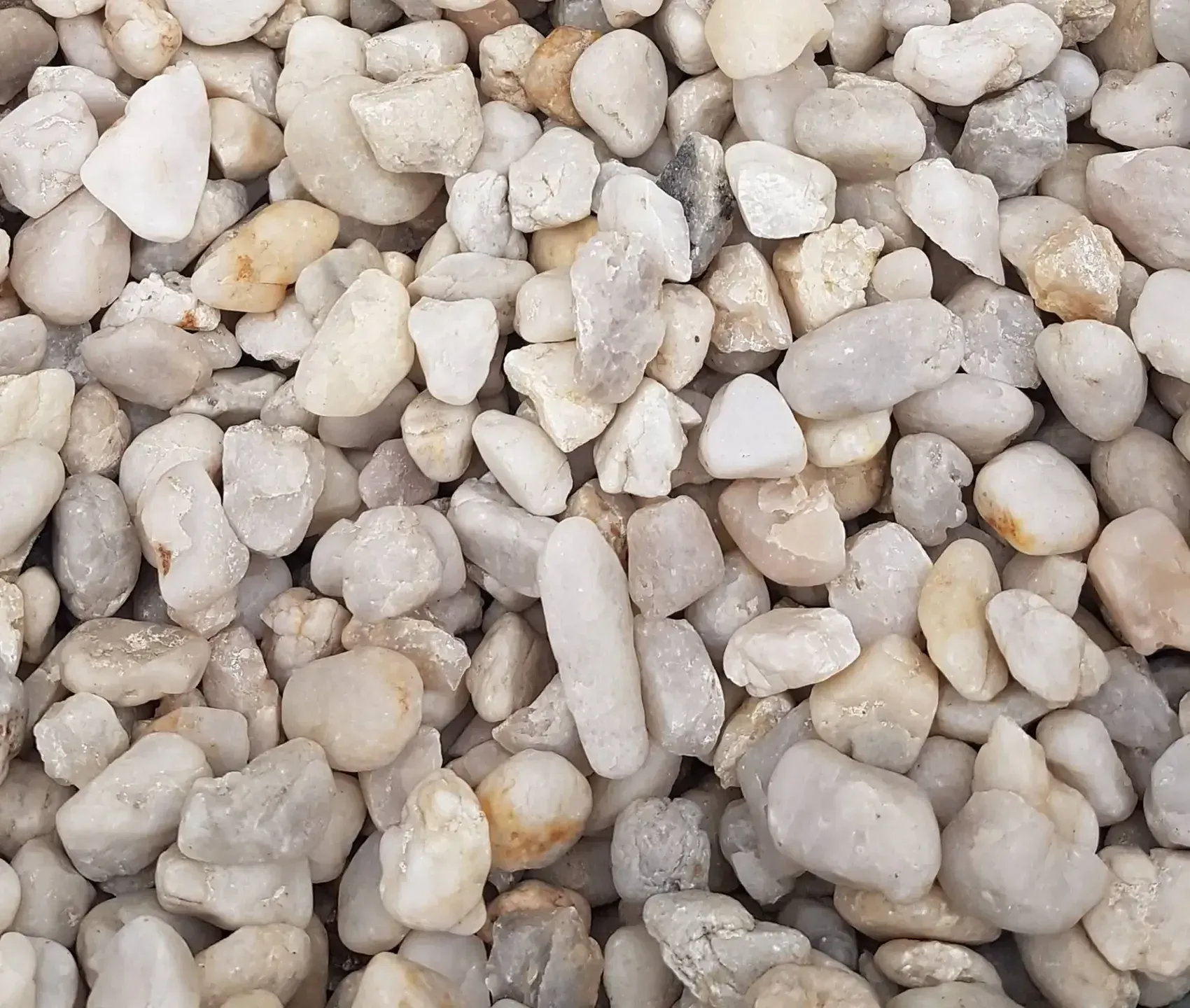 A Pile Of White Gravel Is Sitting On The Ground — T&G Sand and Gravel In Sippy Downs, QLD