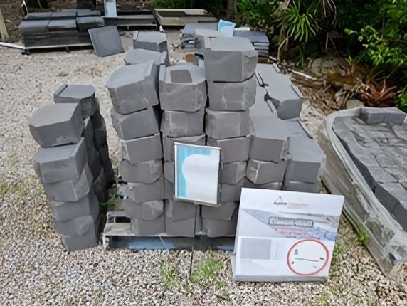 A Pile Of Concrete Blocks With A Box Next To Them — T&G Sand and Gravel In Sippy Downs, QLD