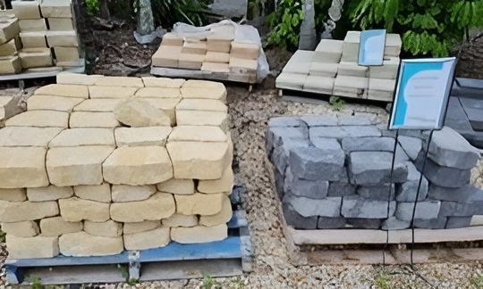 A Pile Of Bricks Is Sitting On Top Of A Wooden Pallet — T&G Sand and Gravel In Sippy Downs, QLD