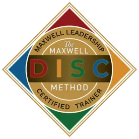 Maxwell Leadership DISC Method certified trainer badge in red, blue, gold, and green