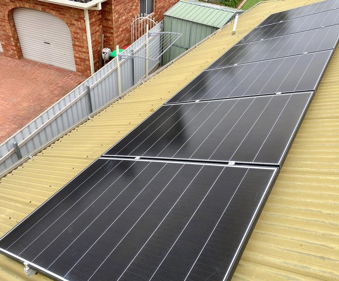 Solar Panels Installed on a Corrugated Metal Roof — Brett Cox Electrical and Solar in Gumly Gumly, NSW