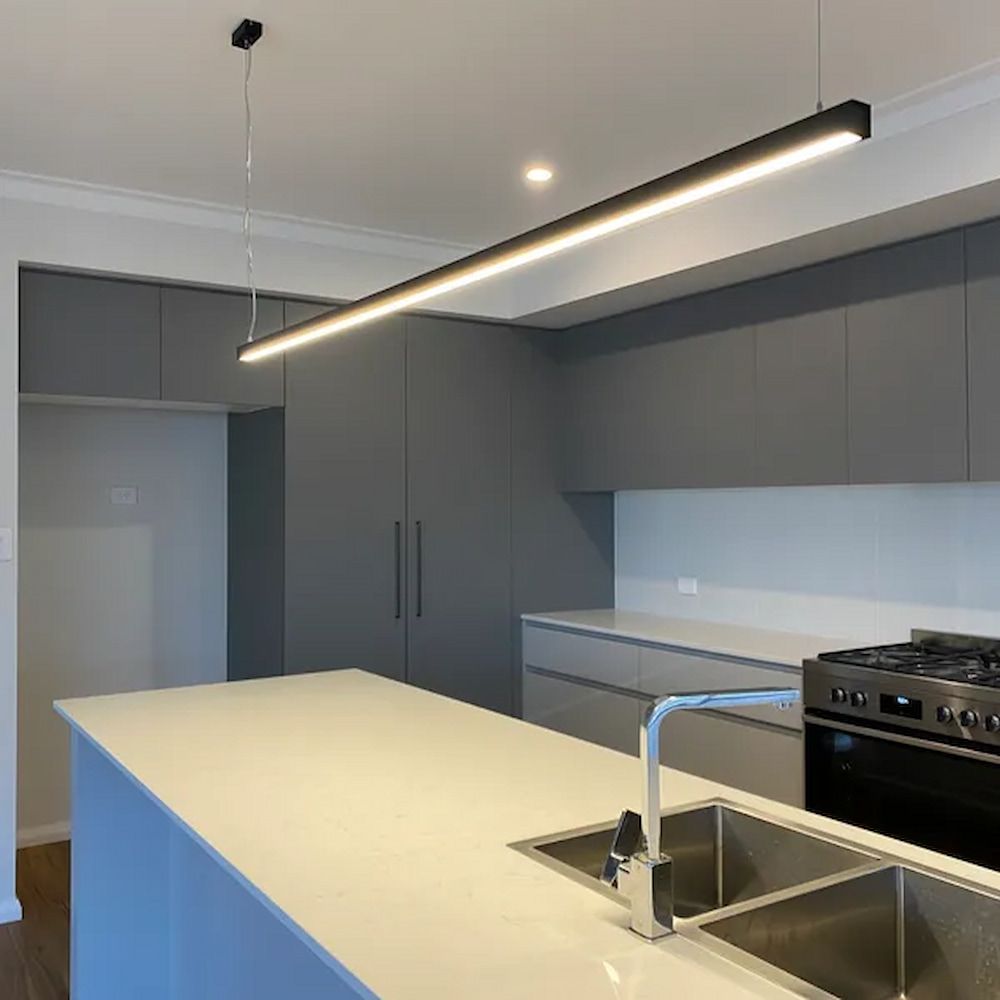 Modern Kitchen With Grey Cabinets, White Countertop and Lights — Brett Cox Electrical and Solar in Gumly Gumly, NSW