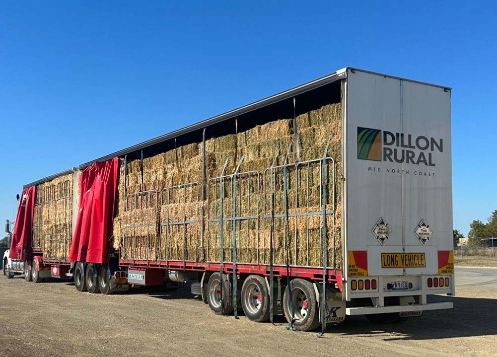 A Dillon Rural Truck Is Loaded With Hay Bales — Dillon Rural In Cundletown, NSW