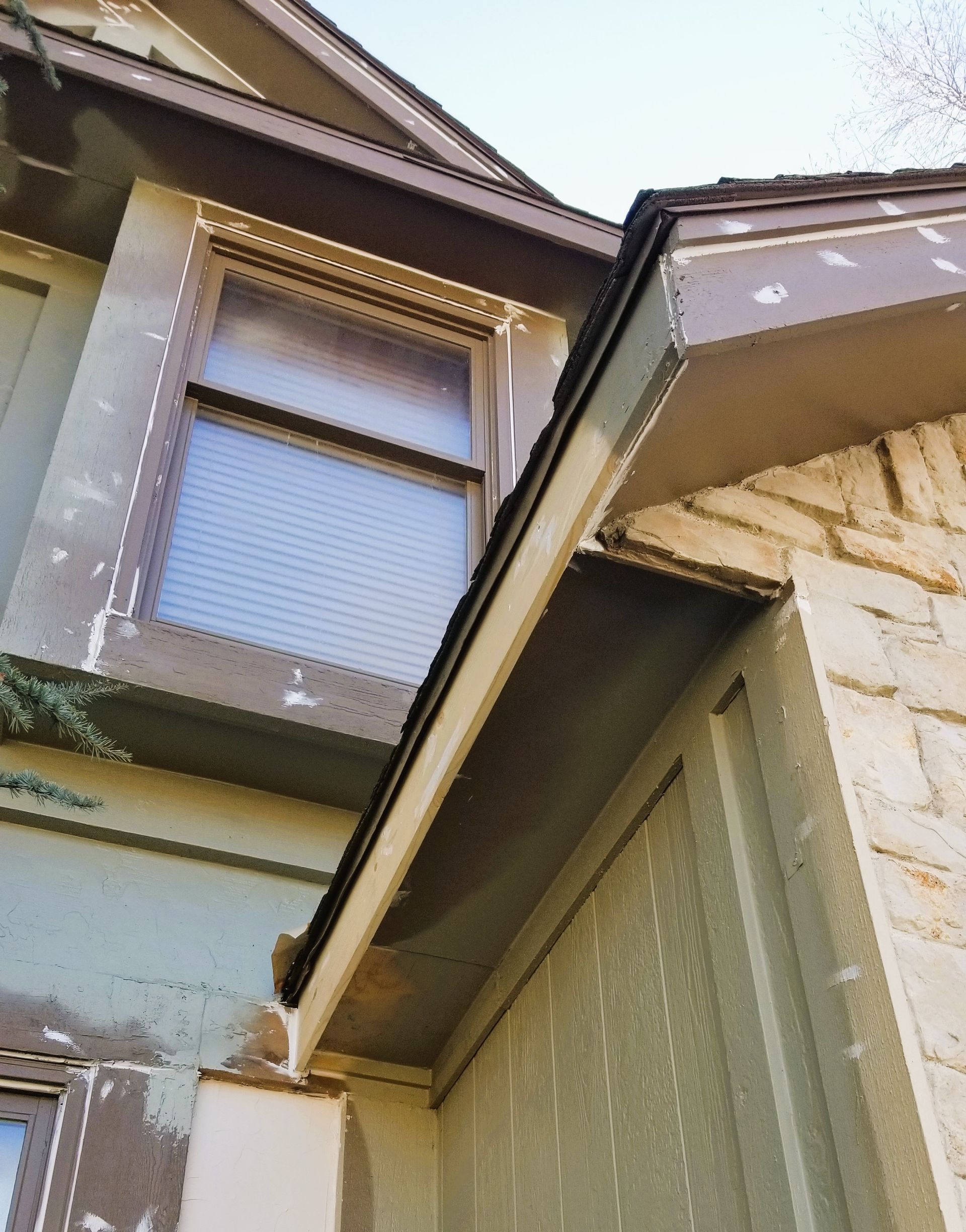 damaged house fascia caused by bad gutter work home pros painting