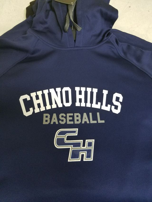 A blue hoodie with "CHINO HILLS BASEBALL" and a "CH" logo printed in white and gray on the chest.