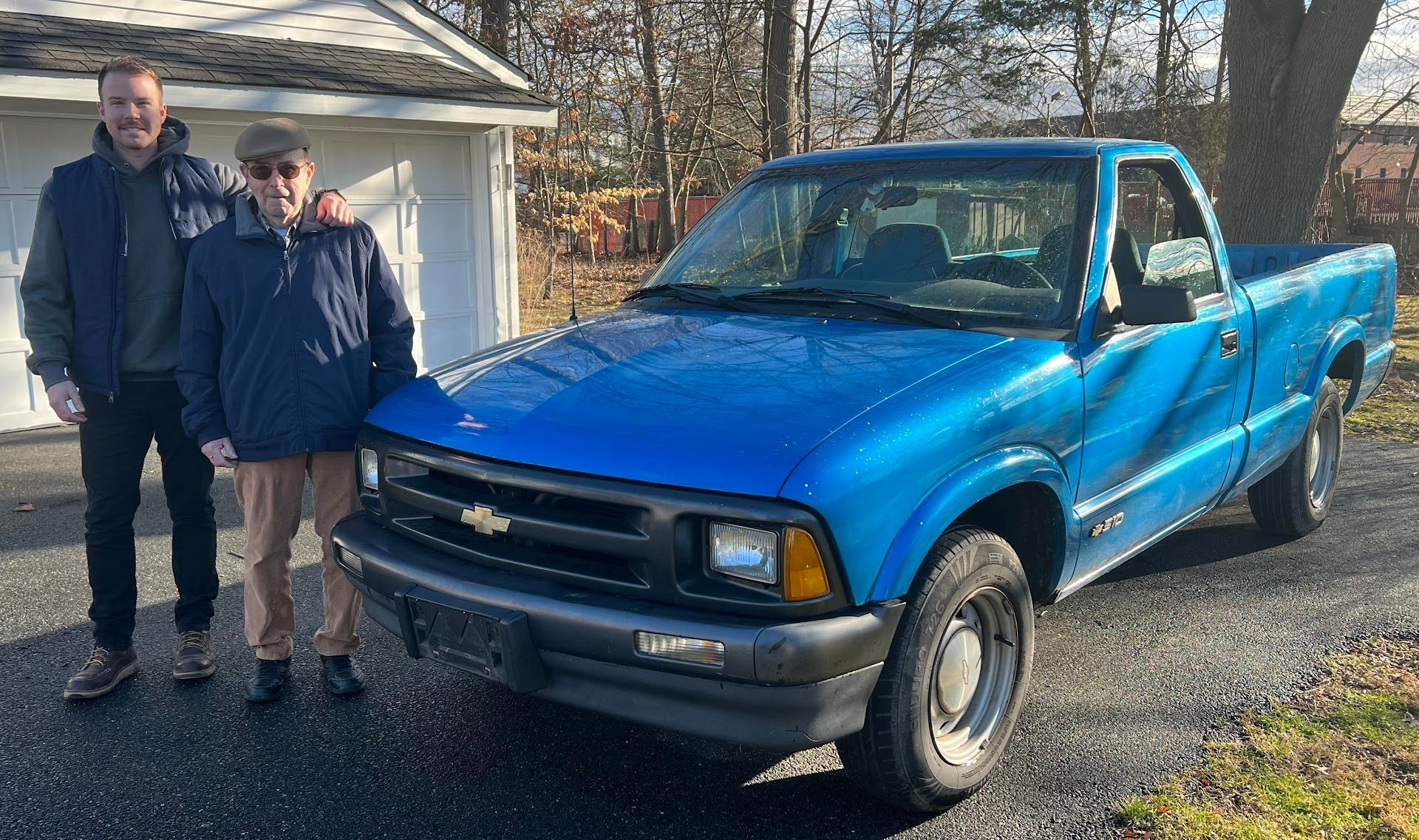 Blue Chevrolet Pickup With Two Customers | JK Auto And Truck Repair