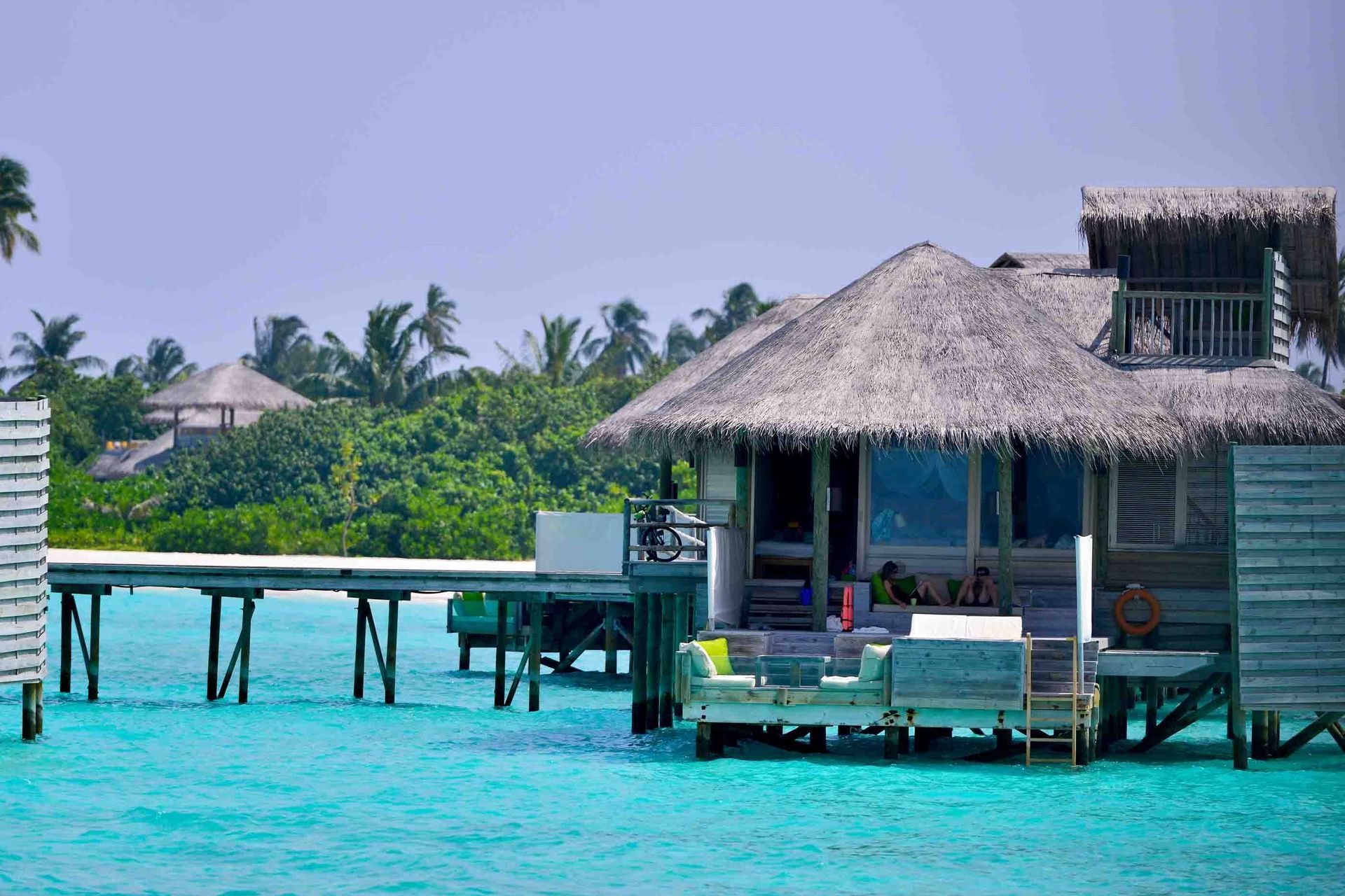 Luxury overwater villa in the Maldives overlooking the lagoon