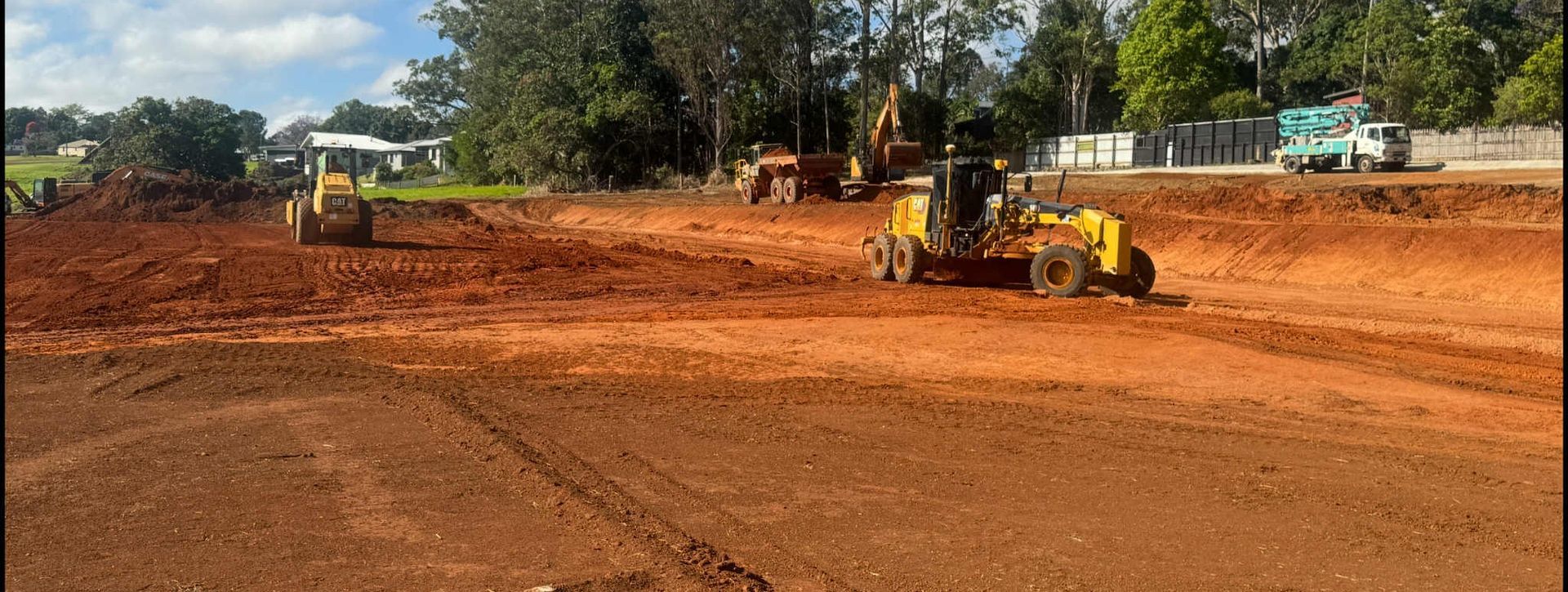 A Building Is Being Built with Scaffolding on The Side of It — Watto's Earthmoving & Machinery Hire in Atherton, QLD