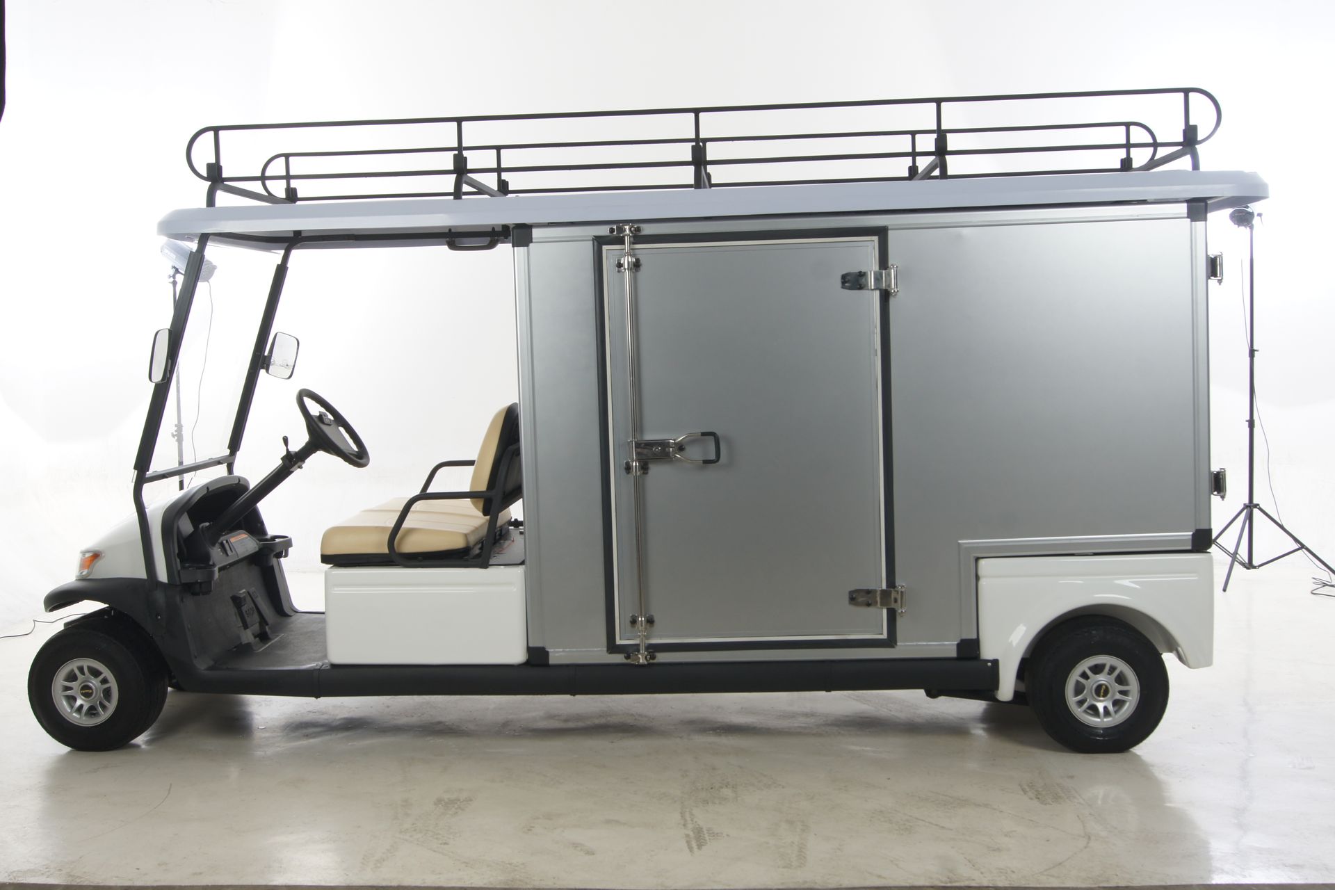 A Golf Cart With a Box on Top of It — Golf Carts Top End in Casuarina, NT