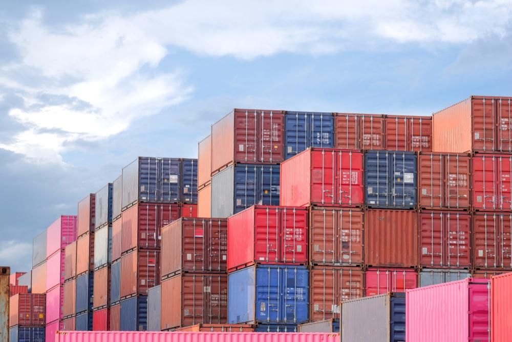 A Bunch of Shipping Containers Are Stacked on Top of Each Other — Spinifex Container Solutions In Ciccone, NT