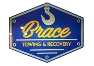 Brace Towing & Recovery blue hexagonal sign with gold lettering and hook icon