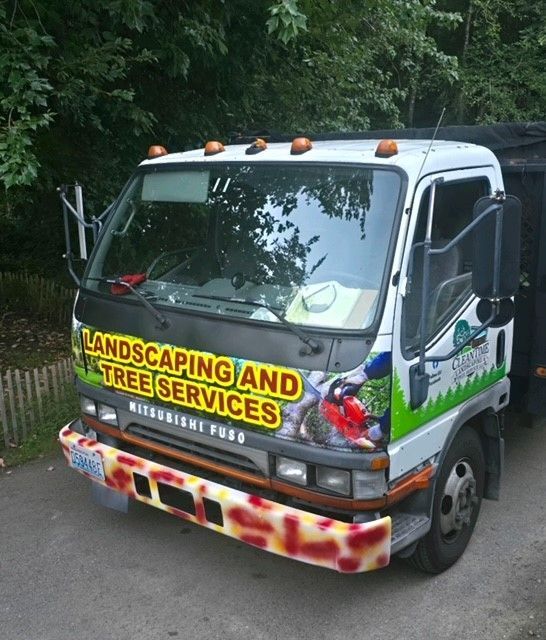 White landscaping truck with 