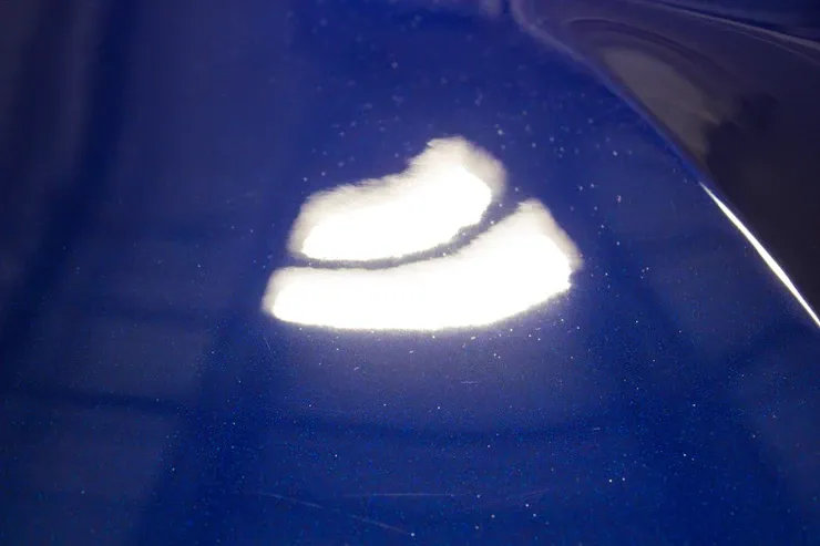 A blue surface with a white circle on it