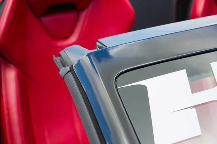 A close up of a car with the letter h on it