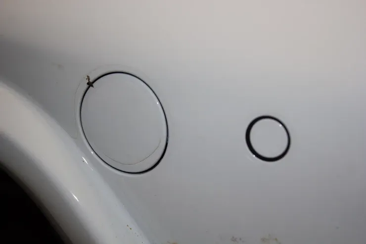 Two circles are drawn on a white surface.