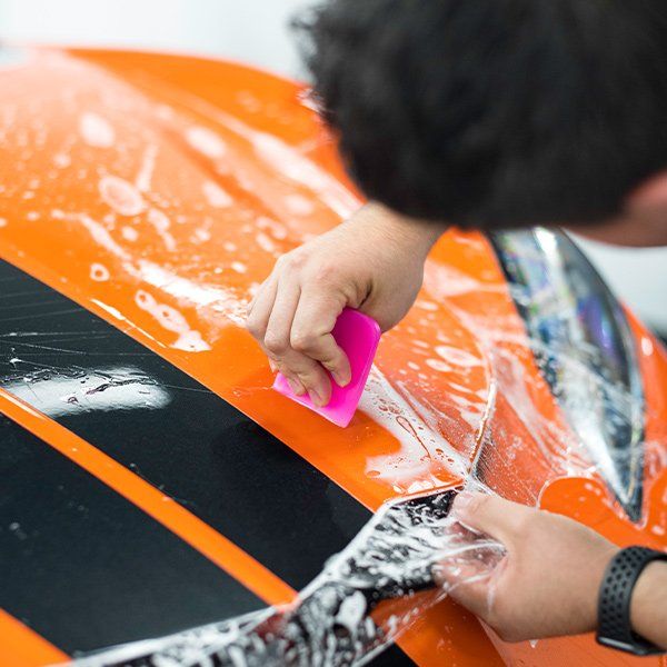 installing paint protection film to corvette