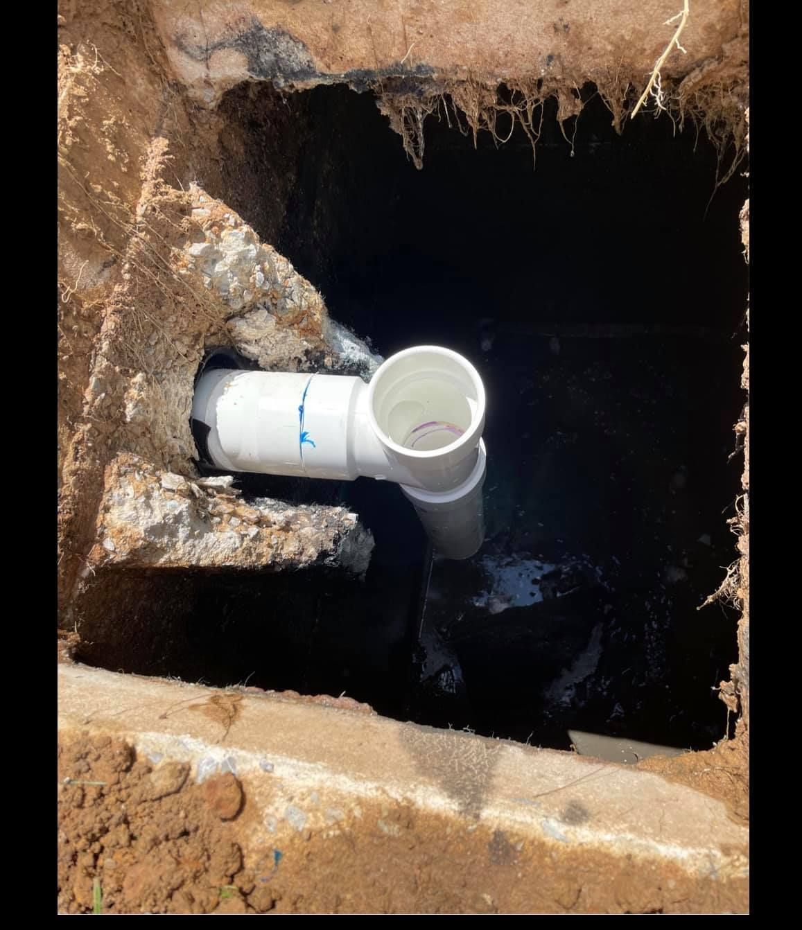 newly repaired pipe of a septic tank