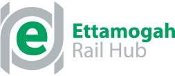 A green and gray logo for ettamogah rail hub