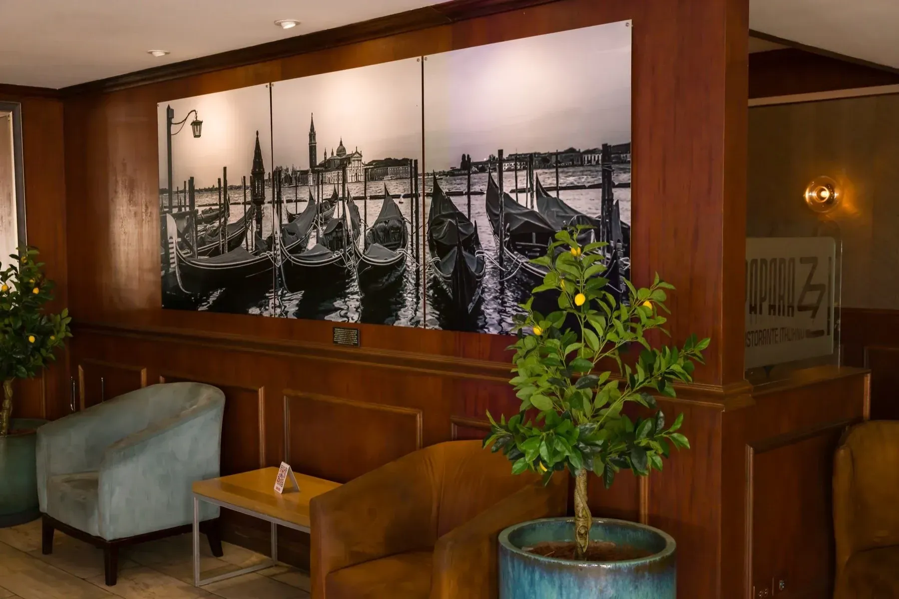 Black-and-white Venice metal triptych in a restaurant