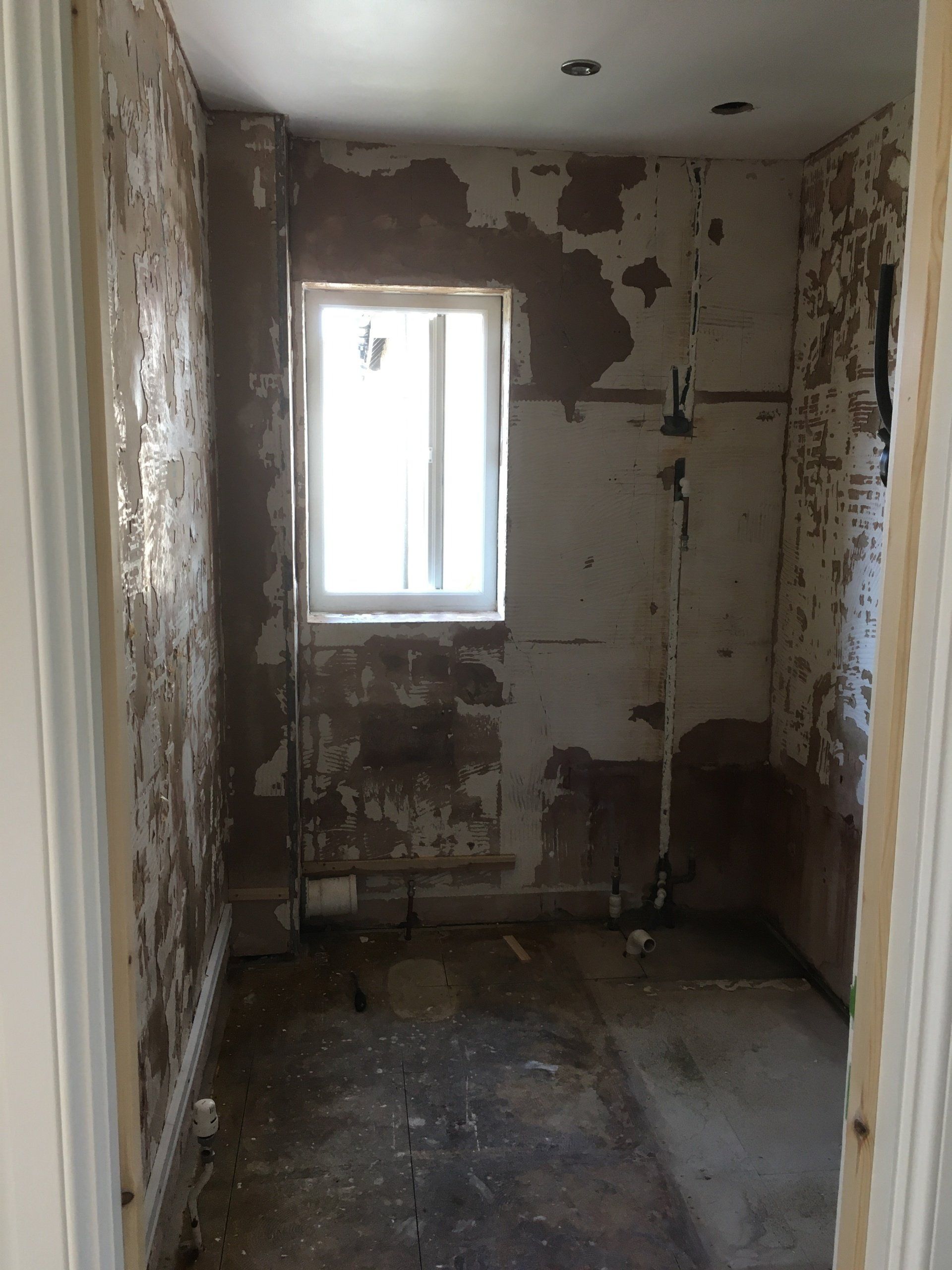 Removal of tiles for new bathroom installation in Witney
