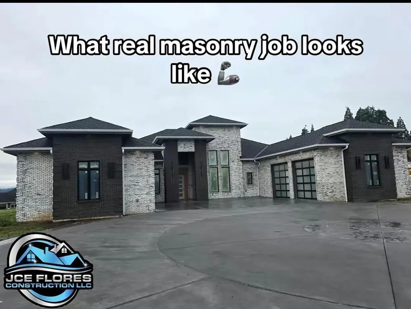 Brick masonry house with dark stone exterior and caption reading “What real masonry job looks like”