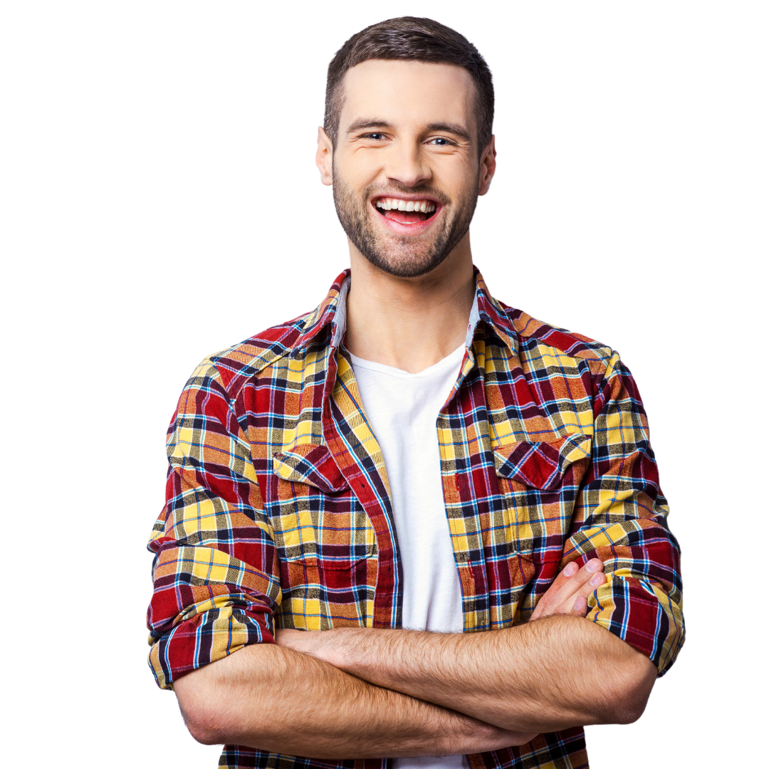 A man in a plaid shirt is smiling with his arms crossed