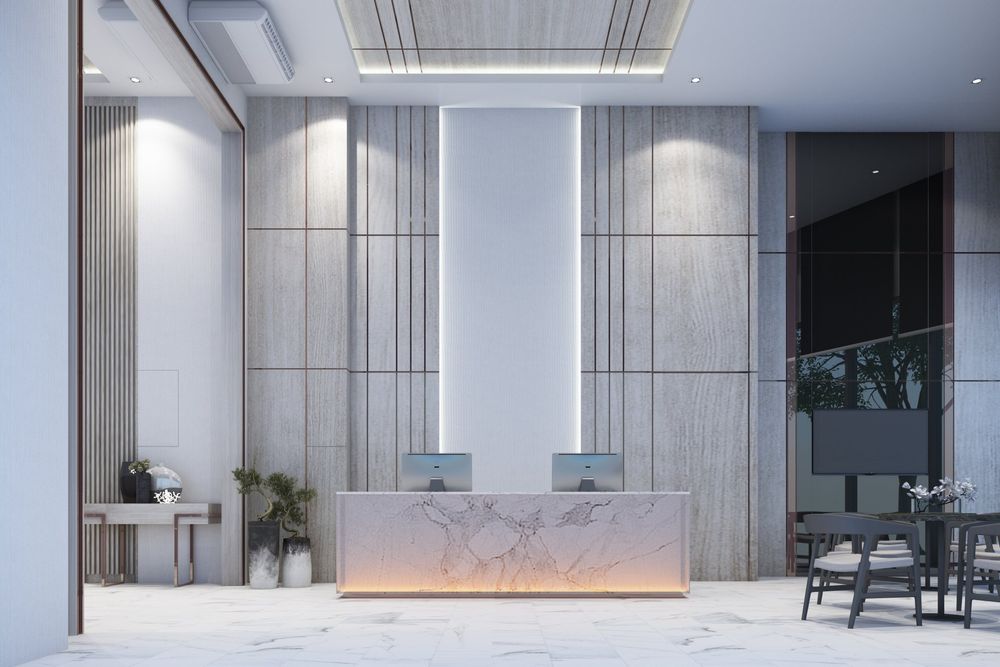 There is a marble counter in the middle of the room.