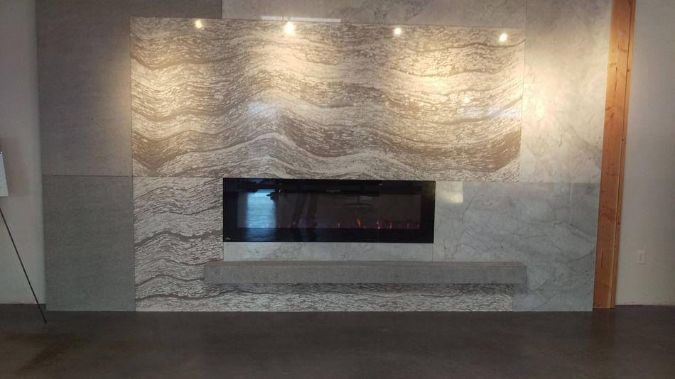 There is a fireplace in the middle of the room.