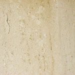 A close up of a beige marble tile with a grainy texture.