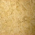 A close up of a piece of wood with a marble texture.