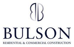 The logo for bulson residential and commercial construction is a residential and commercial construction company.