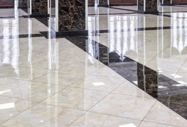A marble floor with columns in a building
