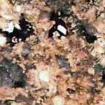 A close up of a pile of rocks on the ground.
