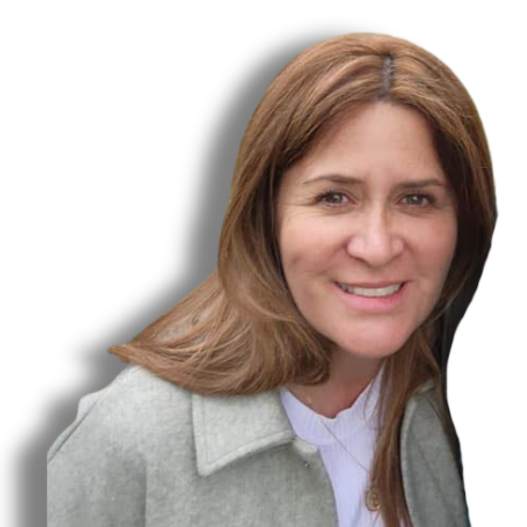 A woman with long brown hair is smiling and wearing a grey jacket