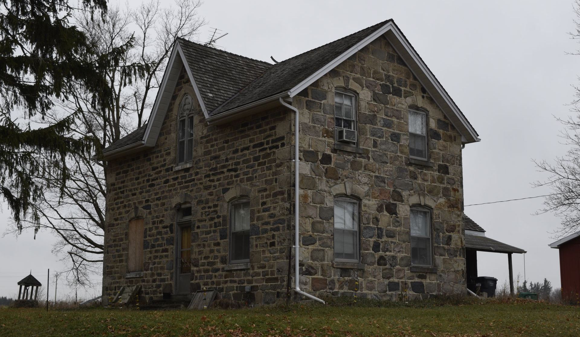 Old stone gothic revival farmhouse