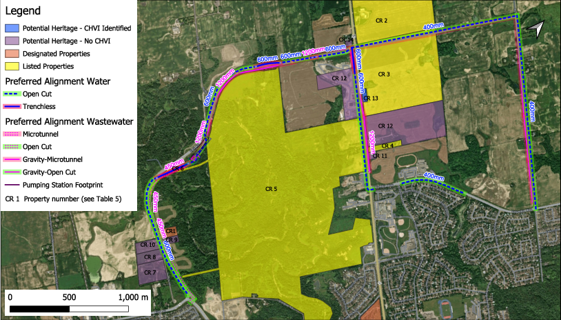 Color-coded land map with parcel boundaries, road labels, and highlighted zones in yellow, pink, and purple.