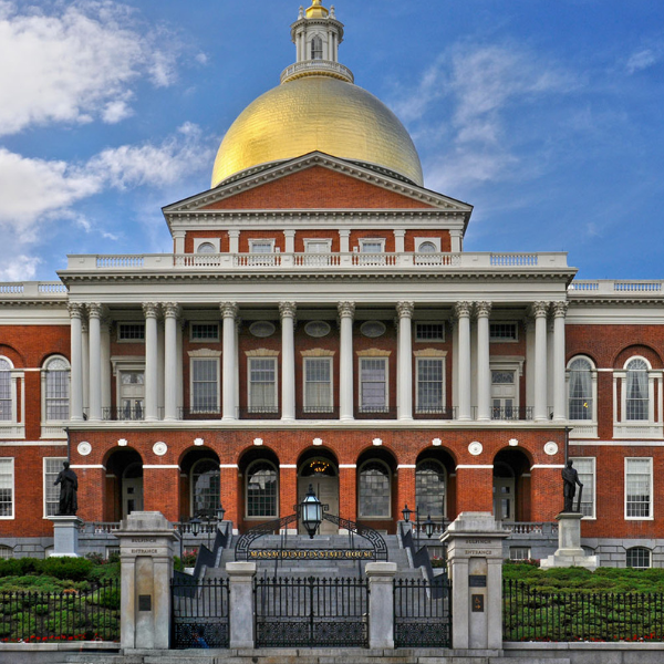 A large brick building with a gold dome on top