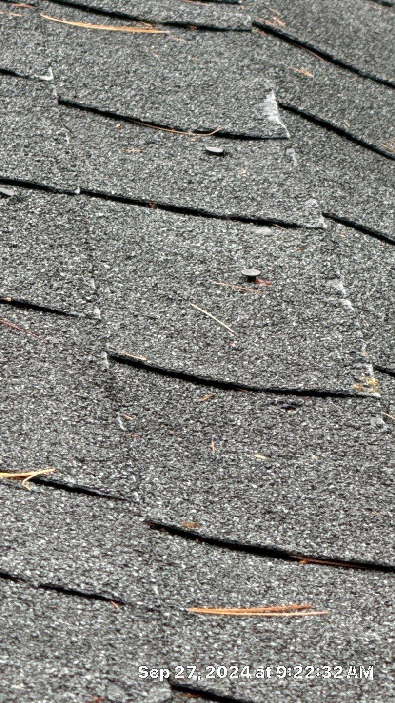 A close up of a roof with a hole in it.