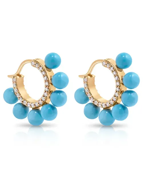 Gold hoop earrings with blue beads and clear stones