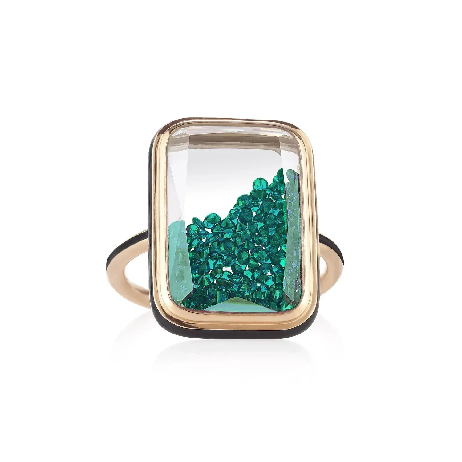 Clear rectangular ring with teal crystal-like stones and gold-toned frame on a white background