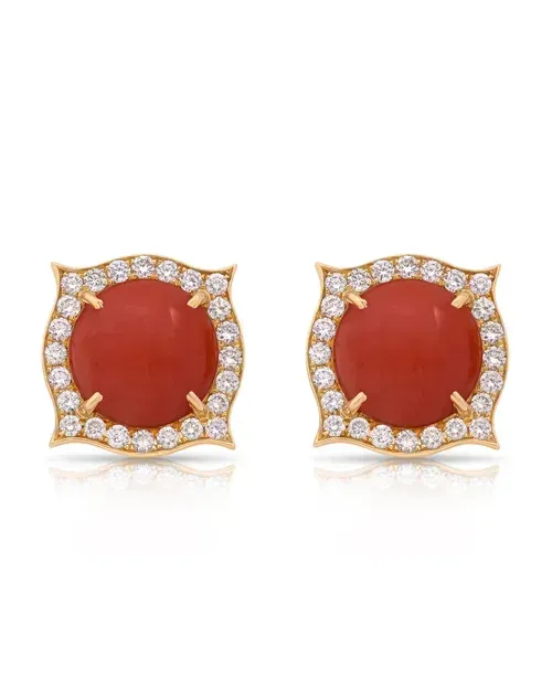 Pair of gold square stud earrings with red center stones and small clear gems around the edges