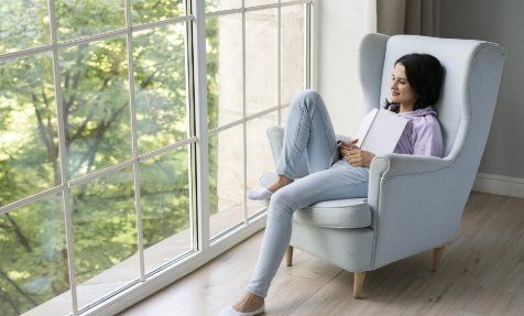 reading a book by a new window