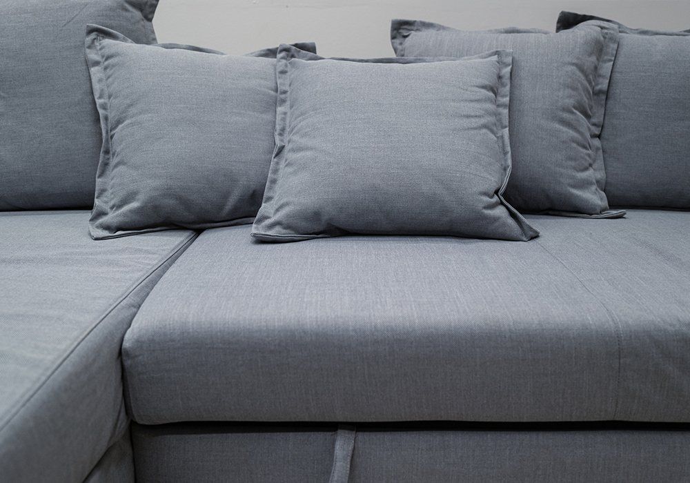 Cushion on Grey Fabric Sofa — Watertown, WI — Recovery Room Commercial Upholstery