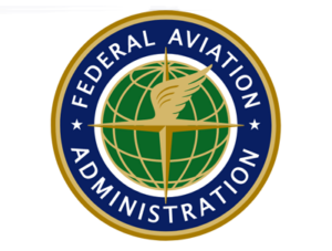 FAA circular logo in blue, green, and gold with a winged emblem at center