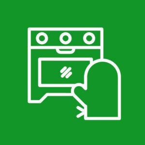 White outline of a stove with a hand turning the oven control on a green background